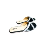 Elegant Design: Black slip-on sandals with crisscross straps adorned with rhinestones.